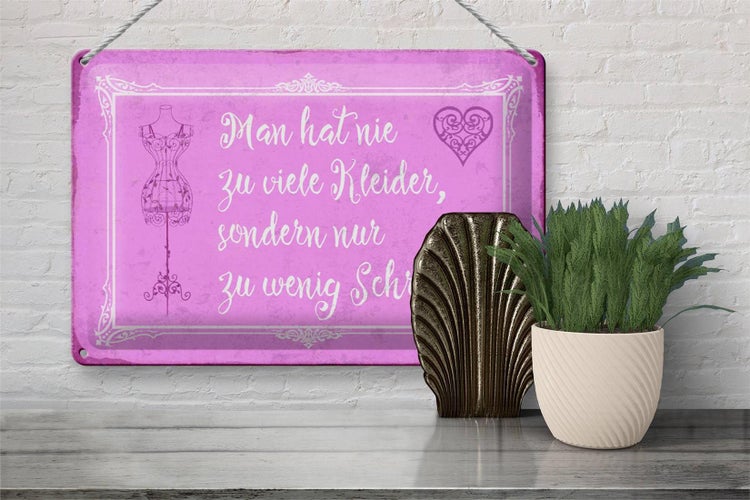 Blechschild Spruch 30x20cm man hat nie zu viele Kleider