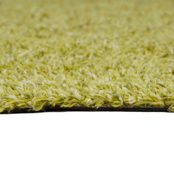 Nahaufnahme eines grünen Teppichs