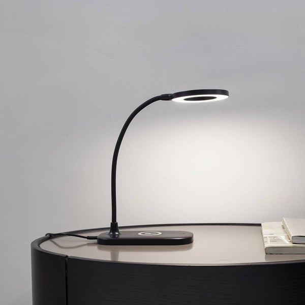 Moderne Wandleuchte mit zwei kreisförmigen Scheiben in Schwarz matt.