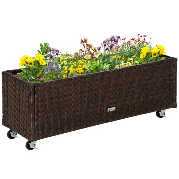 Rechteckiger Pflanzkasten aus Rattan mit Rollen und den Maßen 94,5 x 31 x 36 cm.
