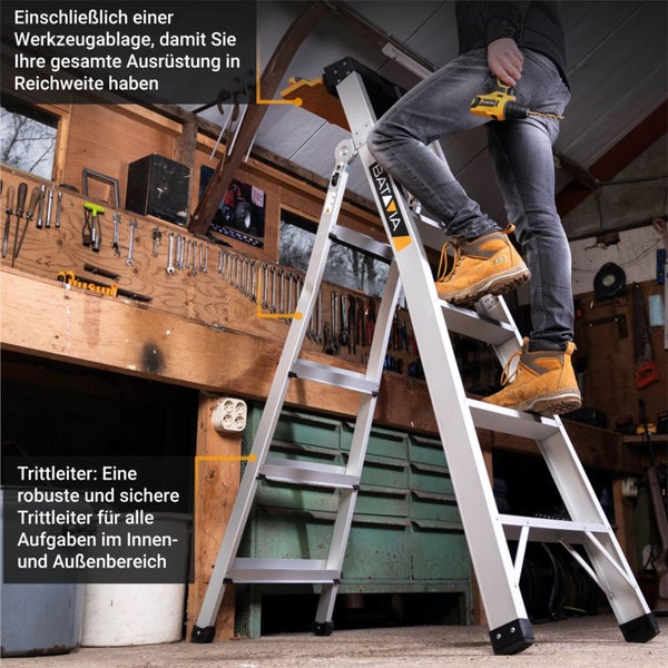 Person auf einer silbernen Aluminium-Trittleiter von Batavia in einer Werkstatt mit einer Bohrmaschine. Die Leiter hat eine Werkzeugablage.