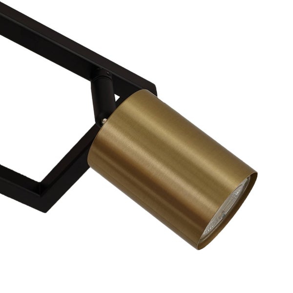 Deckenspot mit goldfarbenem Schirm und schwarzer Halterung