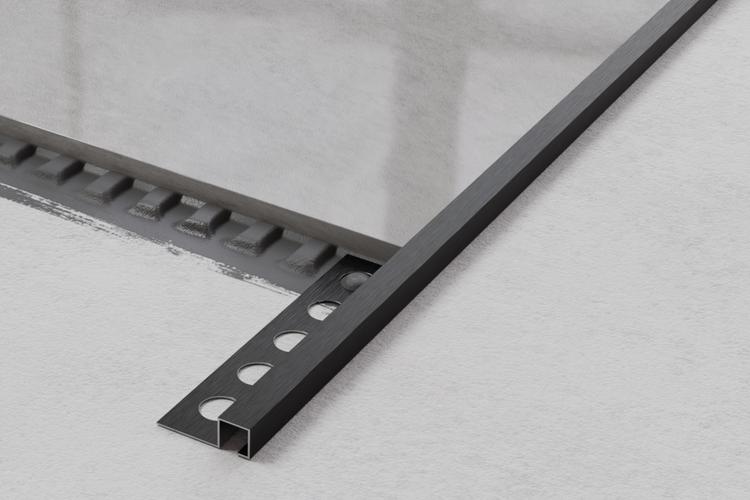 Fliesenprofil aus Metall mit runden Aussparungen zur Kantenverfliesung