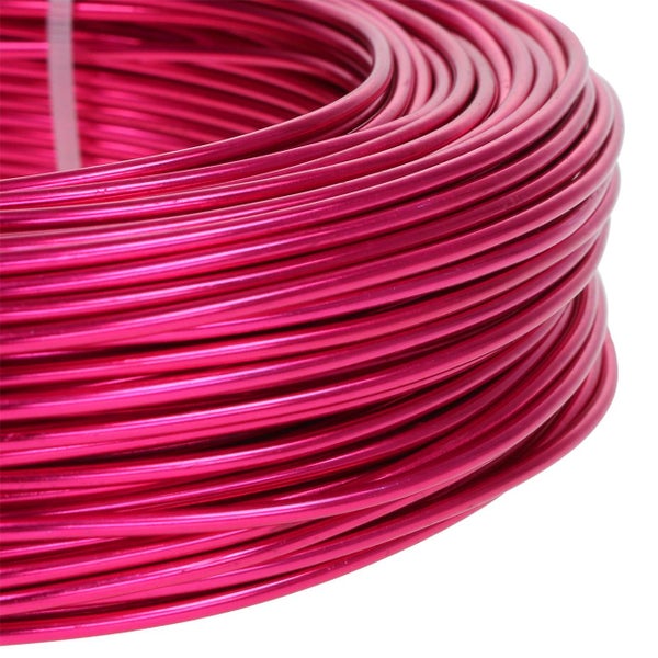 Pinkfarbener Aluminiumdraht auf Rolle für Bastelarbeiten und Dekoration.