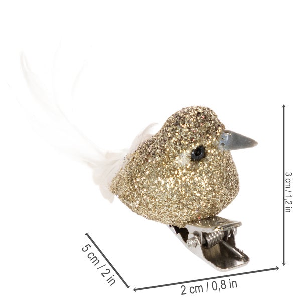 Vogel-Dekofigur mit Glitzer, Feder und Metallclip. Maße: 3 Zentimeter hoch, 2 Zentimeter breit, 5 Zentimeter lang.