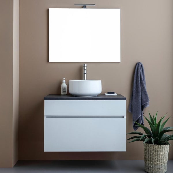 Modernes Badezimmer mit Waschbecken, Unterschrank, Spiegel und Zimmerpflanze