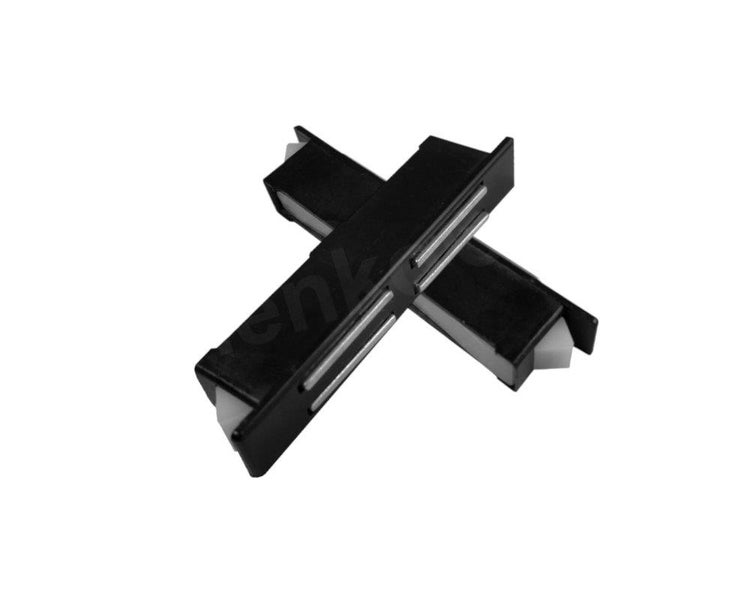 Zwei schwarze Magnet-Schnäpper für Möbel aus Kunststoff mit Magnetstreifen.