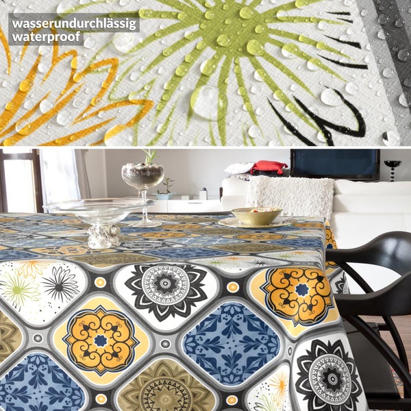 Wasserundurchlässige Tischdecke mit grafischem Fliesenmuster und floralen Ornamenten in einer Wohnzimmerumgebung.
