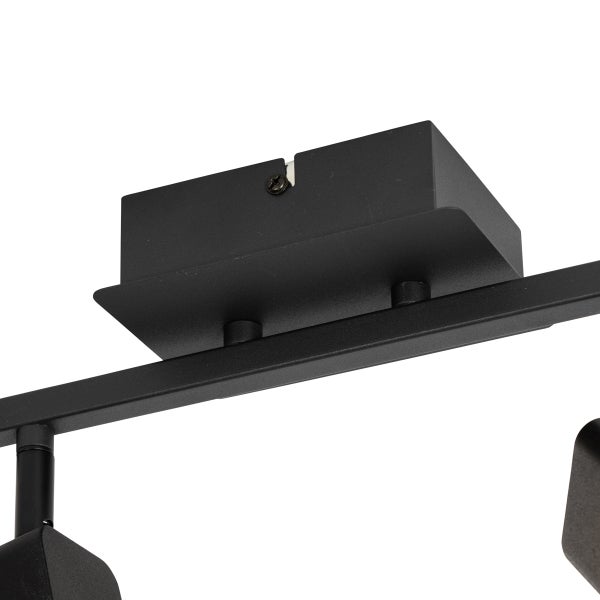 Detail einer schwarzen Schienenleuchte zur Deckenmontage