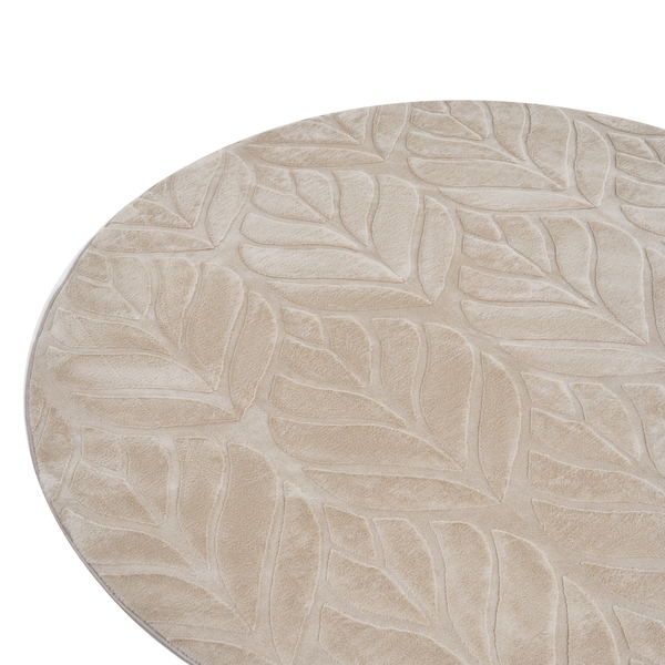 Runder Teppich mit Blattmuster in Relief-Optik.