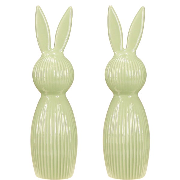 Zwei dekorative Osterhasen aus Keramik