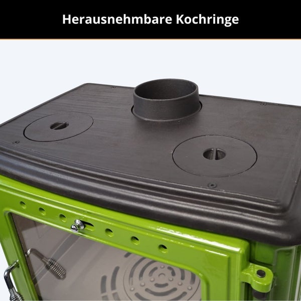 Oberseite eines Kaminofens mit zwei herausnehmbaren Kochringen und einem Rauchrohranschluss.