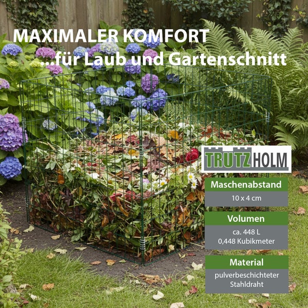 Drahtkomposter mit Gartenabfällen vor Blumenbeet