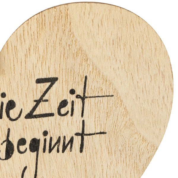 Holzdekoration mit dem Schriftzug Die Zeit beginnt