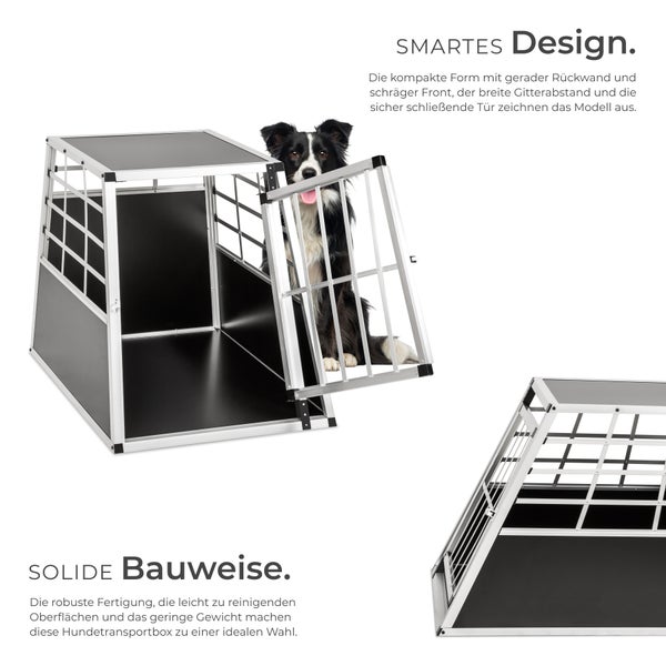 Hundetransportbox aus Aluminium mit Gittertür und Hund