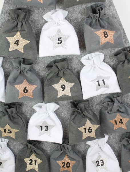 Adventskalender mit Sternen und Zahlen