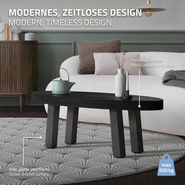 Moderner Couchtisch im Wohnzimmer mit weißem Sofa. Glatte Oberfläche, Profilmaß 8 mal 8 Zentimeter, maximale Belastbarkeit 500 Kilogramm.