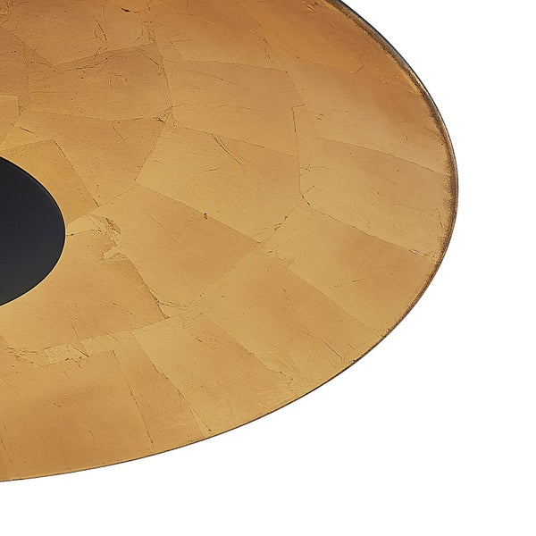 Detailansicht einer runden Platte mit Blattgold-Dekor