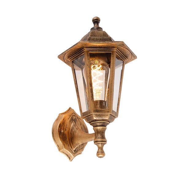 Außenwandleuchte im Laternen-Stil aus Metall und Glas mit sichtbarem Leuchtmittel.