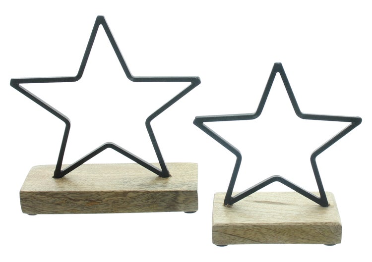 Zwei Sternfiguren auf Holzsockel als Dekoration