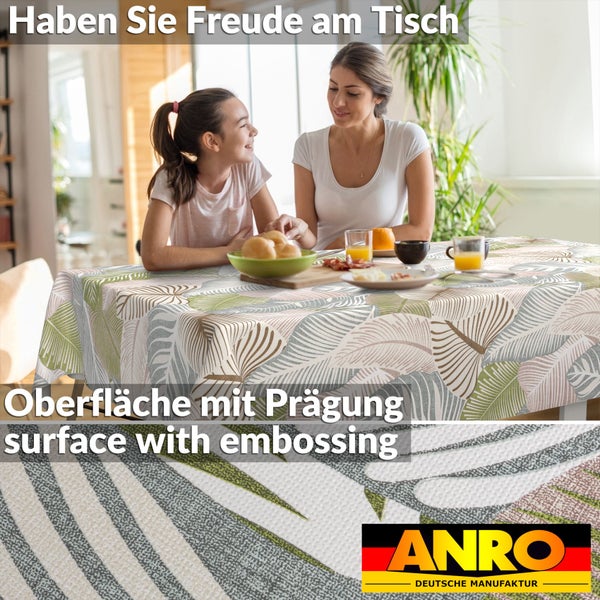 Tischdecke mit geprägter Oberfläche und Blättermuster auf einem Esstisch mit einer Frau und einem Kind sowie ANRO Logo.