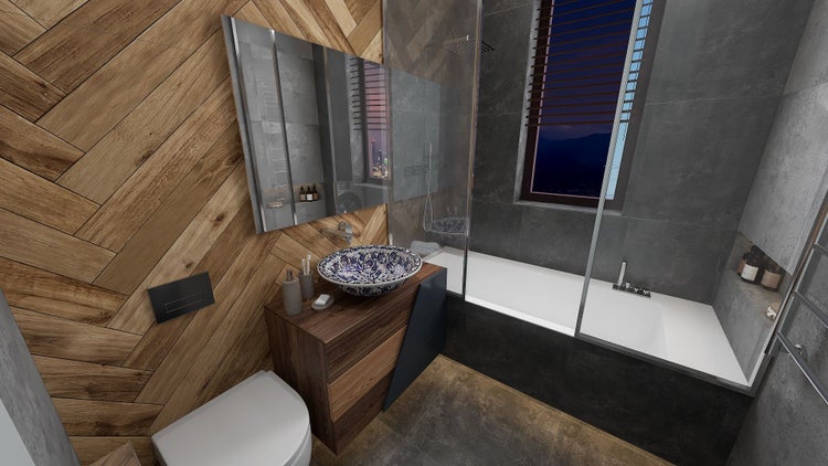 Badezimmer mit Waschbecken, Spiegel, Badewanne und Toilette