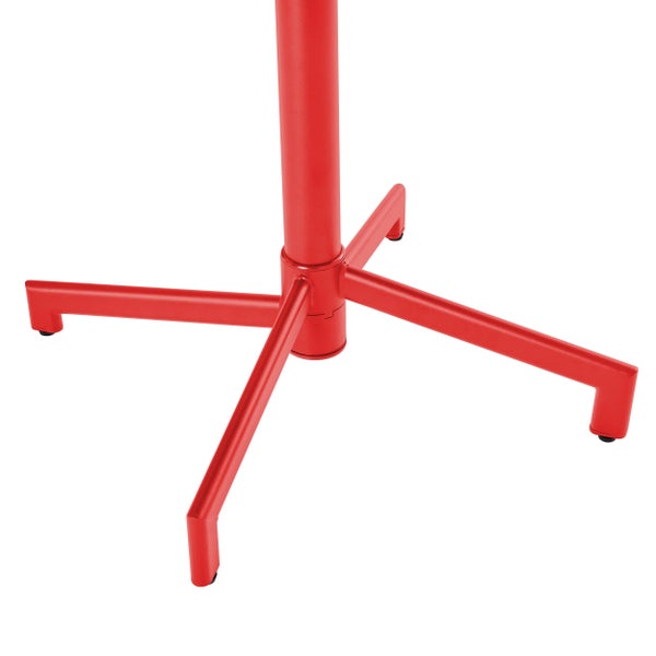 Nahaufnahme eines roten vierfüßigen Standfußes aus Metall mit schwarzen Bodenschonern.