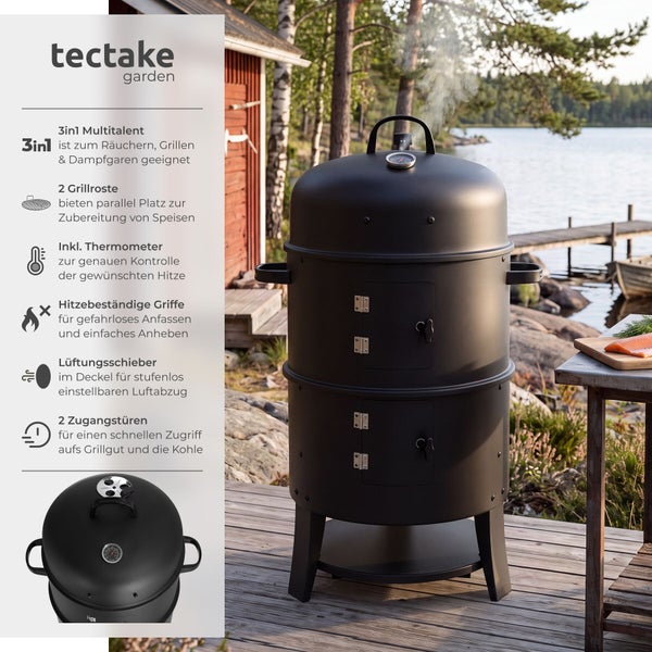 Tectake Garden 3 in 1 Räucherofen mit zwei Grillrosten, Thermometer und Zugangstüren auf einer Holzterrasse an einem See.