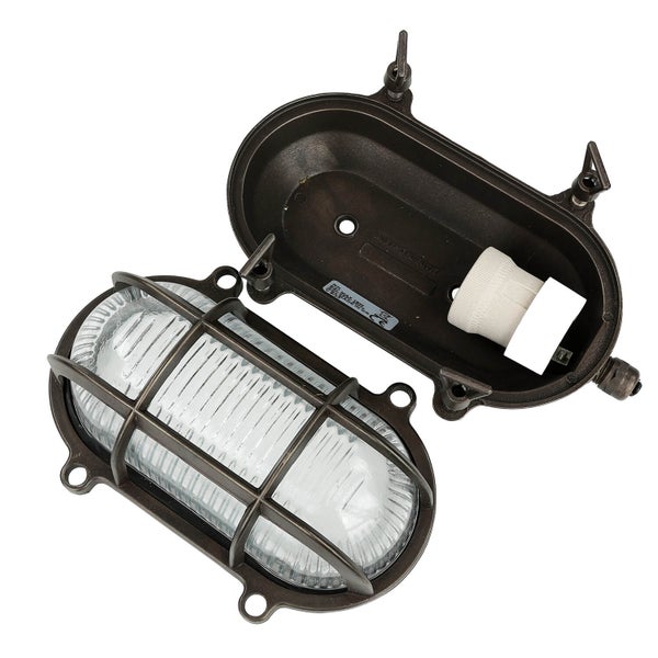 Ovale Außenleuchte mit Schutzgitter und geöffnetem Gehäuse