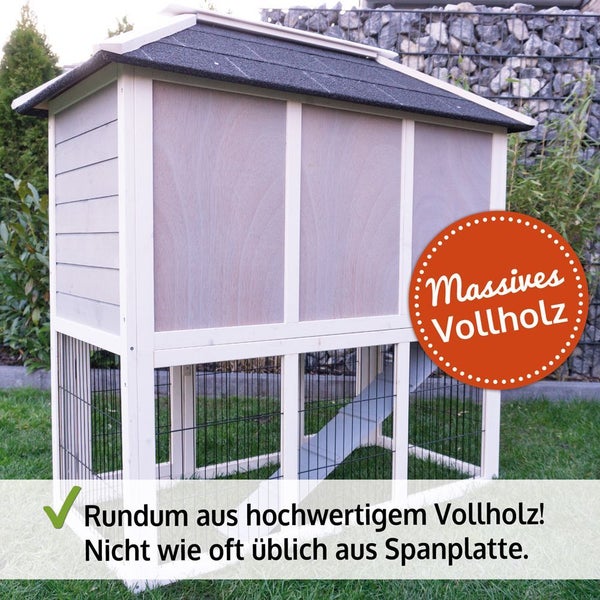 Zweistöckiger Kleintierstall aus massivem Vollholz mit integriertem Freigehege, Rampe und wetterfestem Dach.