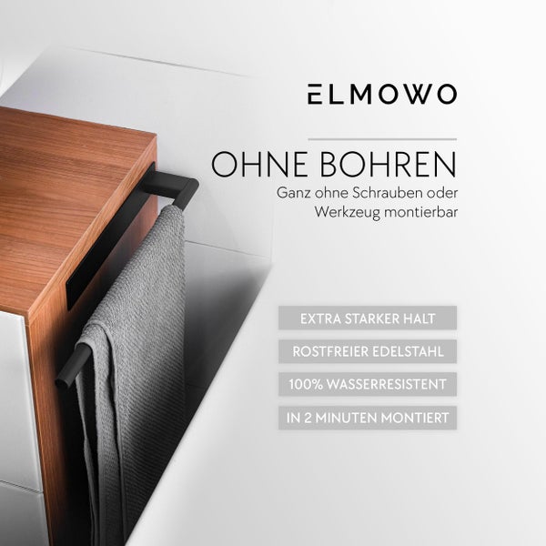 Handtuchhalter von Elmowo aus rostfreiem Edelstahl zur Montage ohne Bohren am Badezimmermöbel mit einem Handtuch.