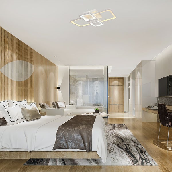 Modernes Schlafzimmer mit Doppelbett und quadratischer LED-Deckenleuchte