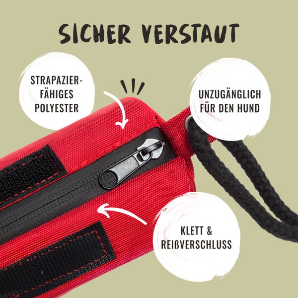 Detailaufnahme einer roten Tasche mit Klettverschluss, Reißverschluss und Kordel aus strapazierfähigem Polyester, die sicher verstaut und unzugänglich für Hunde ist.