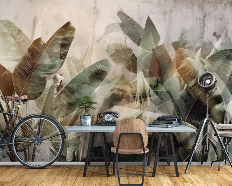 Szene mit Schreibtisch, Stuhl, Fahrrad und Fototapete mit Pflanzenmotiven