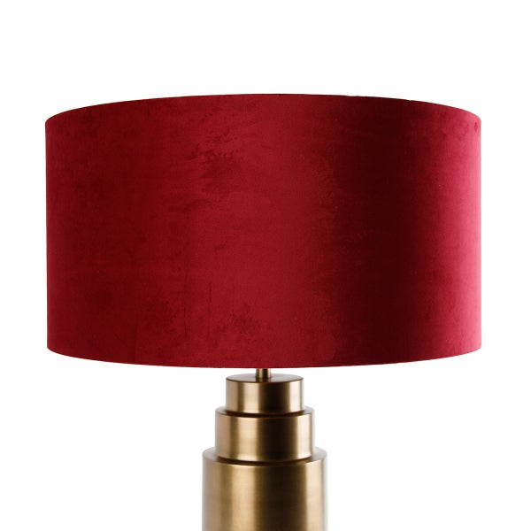 Tischleuchte mit rotem Lampenschirm und goldenem Sockel