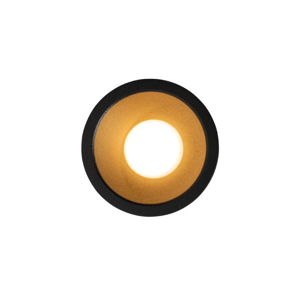 Runde LED-Wandleuchte oder Deckenleuchte in Schwarz mit goldfarbenem Innenreflektor, eingeschaltet.