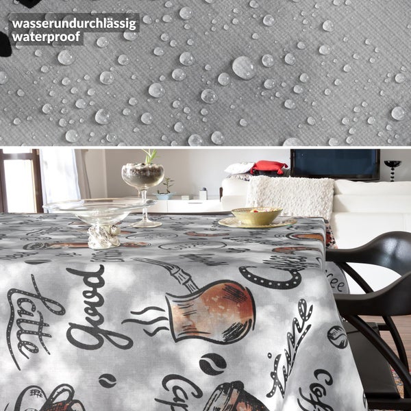 Wasserundurchlässige Tischdecke mit Kaffee-Motiven in einem Wohnzimmer; Detailansicht von Wassertropfen auf dem Stoff.