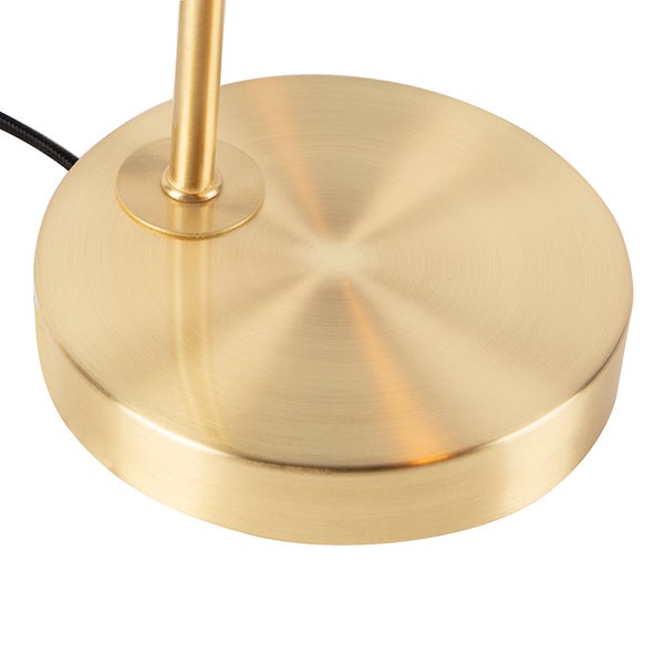 Detailansicht des Fußes einer Tischleuchte aus Metall