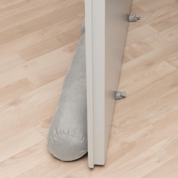 Türdichtung aus Stoff am unteren Rand einer Tür