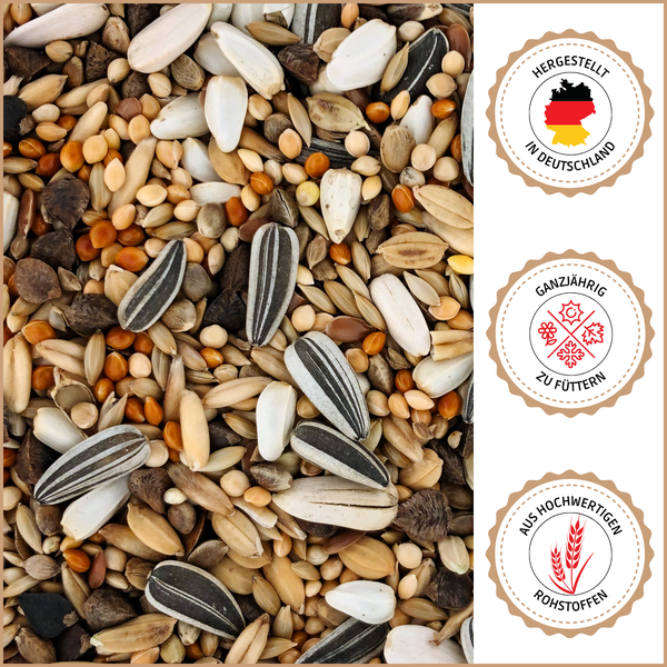 Vogelfutter-Mischung mit Sonnenblumenkernen und Getreide, Siegel: Hergestellt in Deutschland, ganzjährig zu füttern, aus hochwertigen Rohstoffen.