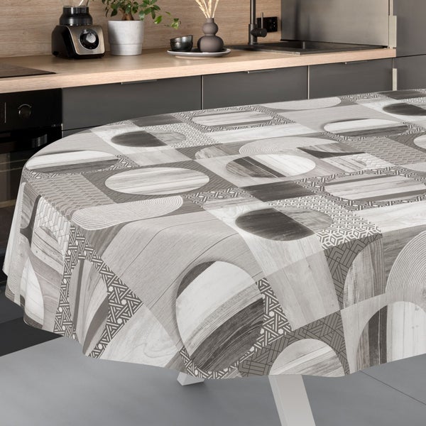 Runde Tischdecke mit geometrischem Muster aus Kreisen und Holzoptik in einer modernen Küche.