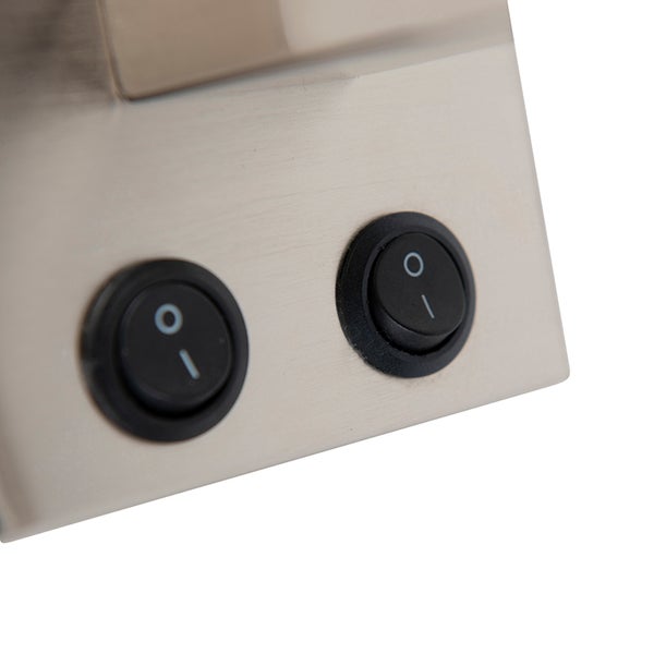 Nahaufnahme von zwei schwarzen Schaltern an einem Gerät