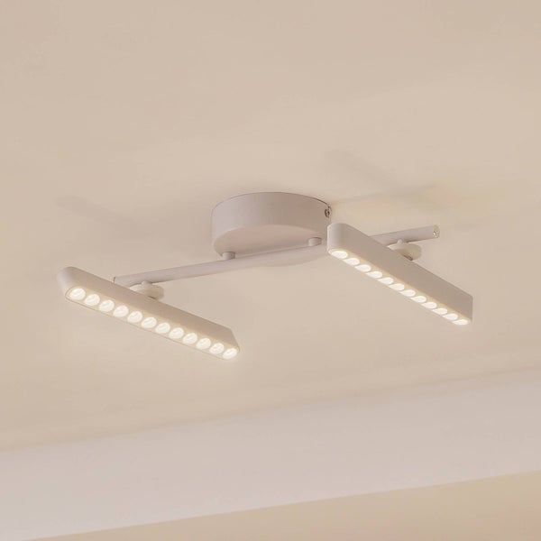 Weiße LED-Deckenleuchte mit zwei schwenkbaren Balken und mehreren integrierten LED-Lichtpunkten.