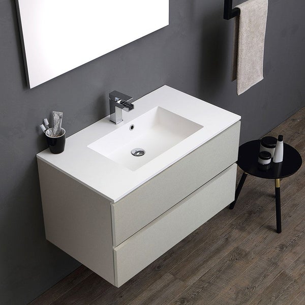 Badezimmer Waschbeckenunterschrank mit zwei Schubladen, Aufsatzwaschbecken und Armatur in einem modernen Badezimmer.