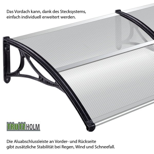 Erweiterbares Haustürvordach aus Polycarbonat mit Kunststoffhalterungen und Aluminiumabschlussleisten von Trutzholm