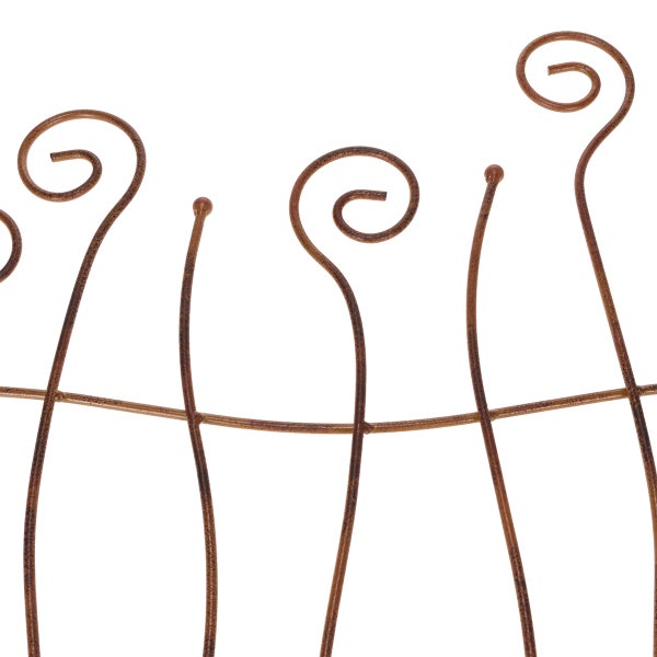 Metallzaun mit dekorativen Spiralen
