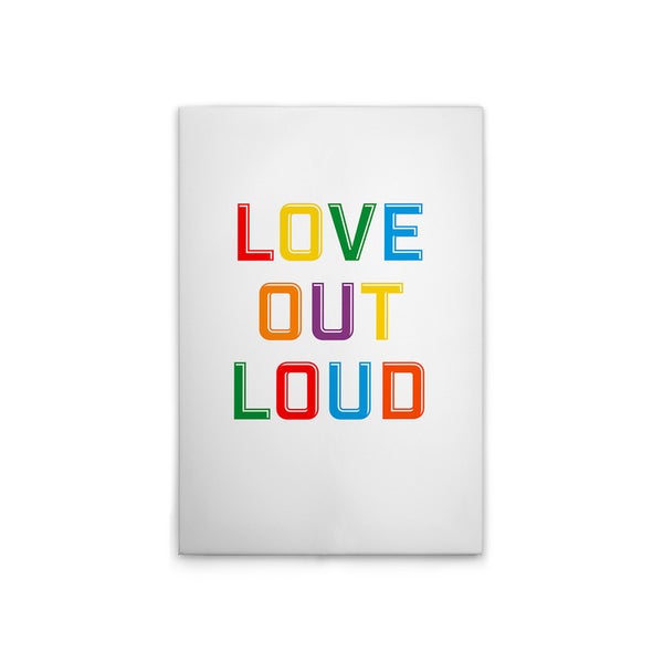 Dekorationsschild mit dem Spruch Love Out Loud in Regenbogenfarben