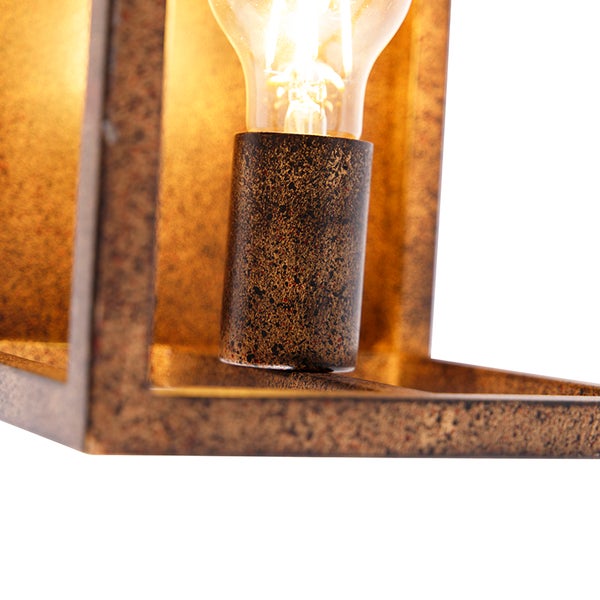 Detailaufnahme einer Glühbirne in einer Metallfassung