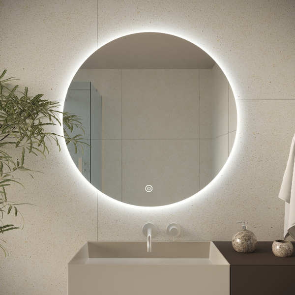Runder Badezimmerspiegel mit integrierter LED Beleuchtung und Touch Schalter, montiert über einem modernen Waschbecken in einem Badezimmer.