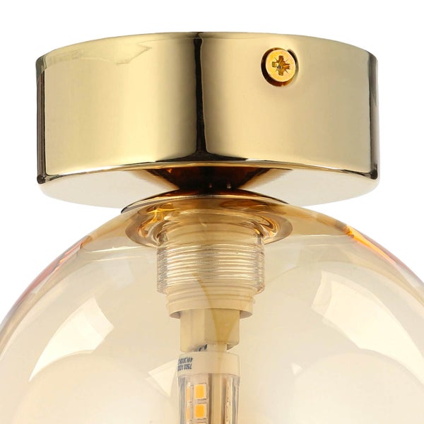 Detailansicht einer Deckenleuchte mit einem Lampenschirm aus Glas